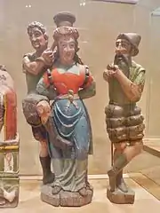 Scrignac (ancienne chapelle de Coat-Quéau), statues de sainte Apolline et de ses bourreaux, bois peint (v. 1560), musée départemental breton, Quimper.