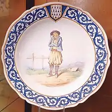 Assiette à décor bretonnant représentant un pilhaouer des Monts d'Arrée.