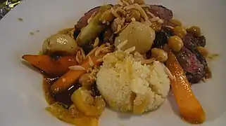 Rôti d´agneau du Bourbonnais aux épices douces, semoule aux fruits d´hiver