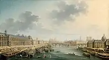 tableau : la seine encombré de barges et péniches chargées, accostées aux quais.