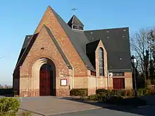 Photographie montrant l'église Notre-Dame-de-Lourdes de Sainte-Olle