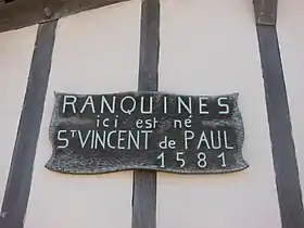 Inscription « Ici est né Vincent de Paul 1581 » en façade de Ranquines