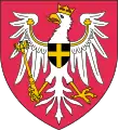 Blason en couleurs représentant un aigle blanc ceint d'une couronne et portant sceptre, sur fond rouge.