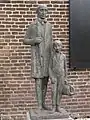 Statue de père et fils Smits par René van Seumeren