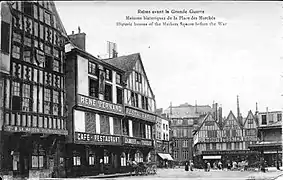 Carte postale montrant les maisons à pan de bois.