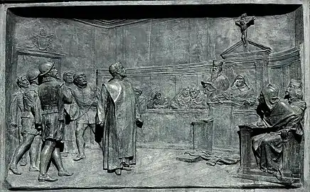 Bas-relief du piédestal: Giordano Bruno devant l'Inquisition