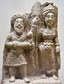 Allat et une divinité masculine. Musée national d'Irak.