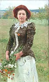 Portrait d'une jeune fille tenant un bouquet.