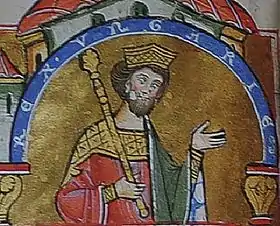 Enluminure médiévale d'un roi avec sa couronne et son sceptre