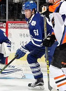 Photographie couleur d'un joueur de hockey sur glace