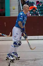 Joueur freinant à l'aide de ses butées