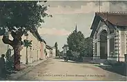 Carte postale, Rion, Vue sur la rue du commerce au début du XX.