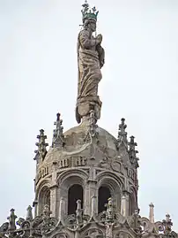 Clocher : lanterne et statue de la Vierge.