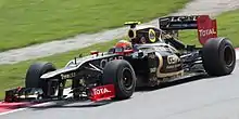 Grosjean pilote une Lotus F1 à Sepang en 2012.