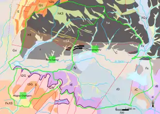 Carte en couleurs montrant le zonage géologique d'un territoire.