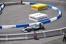 Photo d'une BGP 001 aux couleurs de Mercedes dans le stade olympique de Munich