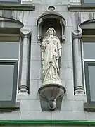 Sculpture Le Commerce (façade nord)