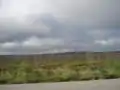 Vue sur la Route de la Baie James à un endroit ravagé par un feu de forêt