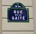 Plaque de rue de la rue de la Gaîté, photographiée en 2015.