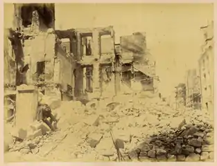 Au coin de la rue de Lille, après les dommages de la guerre franco-prussienne.