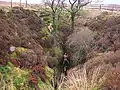 Vue de l'entrée du gouffre de Rumbling Hole.