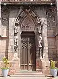 Portail gothique du XIVe siècle avec tympan "Ascension" (1847)