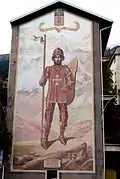 Fresque dédiée à saint Maurice sur la place du marché, avec la devise « en adversité, bon cœur », ajoutée au blason de la ville en 1565 par le duc Emmanuel-Philibert