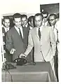 Hassan II avec B. Senoussi alors ministre des PTT.