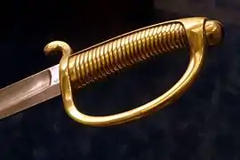 Poignée d'un « briquet », sabre d'infanterie typique des Guerres napoléoniennes.