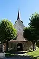 Église de Saint-Aubin (l'entrée et son horloge).