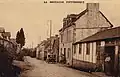 Saint-Thuriau : la Grand-Rue vers 1920 (carte postale).