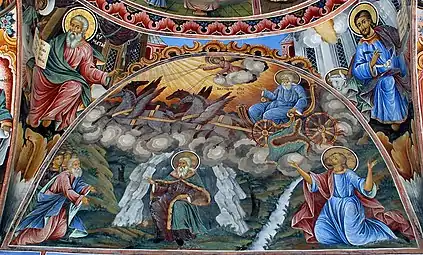 Élie dans la grotte et sur un char de feu. Fresque du monastère de Rila (Bulgarie).
