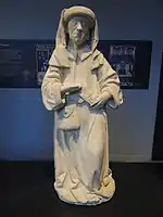 Statue de l'apôtre Matthieu avec sa bourse de collecteur d'impôts, ancien couvent des Carmes de Nantes.