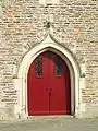 Église Sainte-Colombe : la porte d'entrée située à l'est.