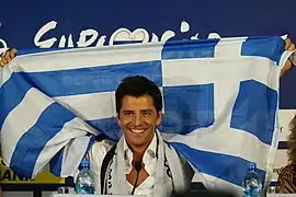 Description de l'image Sakis Rouvas Raising Greek Flag.jpg.