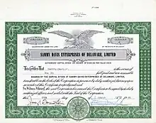 Action fondatrice n° 1 de Sammy Davis Enterprises of Delaware, Ltd. de 6 parts de 100 $ chacune, émise le 25 mars 1965, enregistrée au nom de Sammy Davis Jr. et portant sa signature manuscrite de président. Le capital-actions de sa société de production était de 10 000 $.