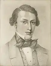 Portratit en noir et blanc d'un jeune homme en costume