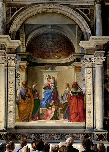 La Vierge et l'Enfant avec quatre saints  dans le contexte de son autel d'origine, 1505. Huile/ bois (transposée sur toile) 500 × 235 cm. San Zaccaria, Venise