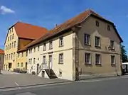 Ancien moulin (XVIIe-XVIIIe-XIXe), actuellement salle des fêtes, 17 rue des Comtes-de-Nassau.