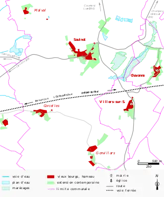 Vue d'une carte en couleur représentant les étapes de développement du bâti d'un bourg.