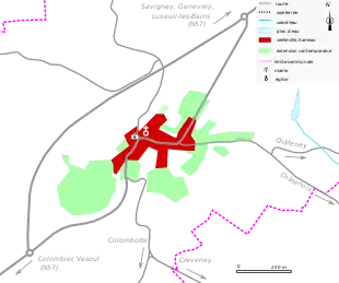 Vue d'une carte en couleur représentant les étapes de développement du bâti d'un bourg.