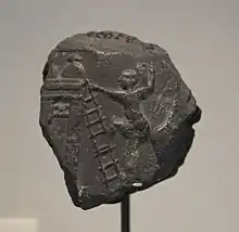 Bulle d'argile avec empreinte de scellement représentant une scène d'engrangement du grain. Musée du Louvre.