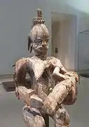 Sculpture en bois : figure de l'Emetejevwe