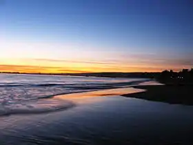 Coucher de soleil sur Seacliff State Beach, à Aptos.