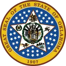 Sceau de l’Oklahoma (LABOR OMNIA VINCIT au centre du sceau).