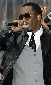 Skylar Grey collabore régulièrement avec des rappeurs comme Eminem, Puff Daddy ou encore Dr. Dre (de gauche à droite).