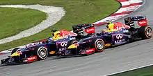 Photo de Vettel et Webber en Malaisie en 2013