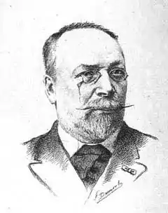 Tête d'un homme portant une longue moustache horizontale, la barbe, et des binocles.