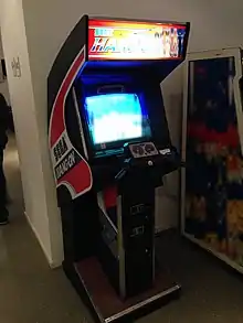 Borne d'arcade (meuble noir, rouge t bleu équipé d'un écran).