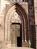 Portail gothique du XIVe siècle avec tympan "Pentecôte" (1848)